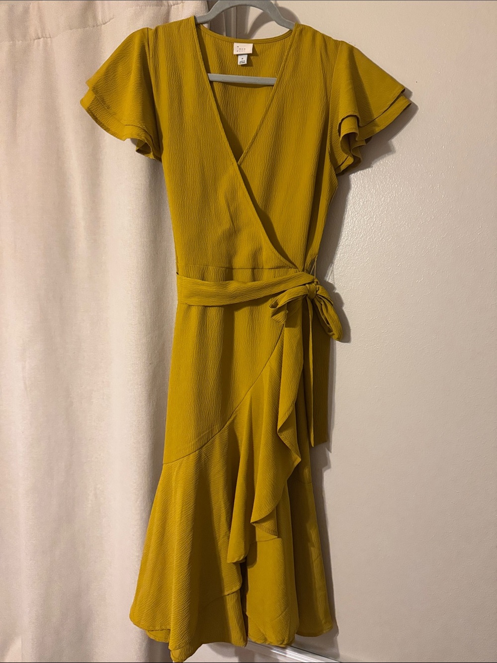 a new day Mustard Wrap Midi Dress with Ruffle Hem. Size medium